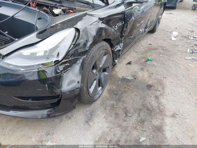 5YJ3E1EB7NF165647 Tesla 2022