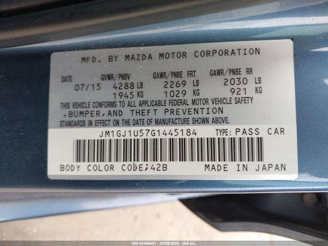 JM1GJ1U57G1445184 Mazda py