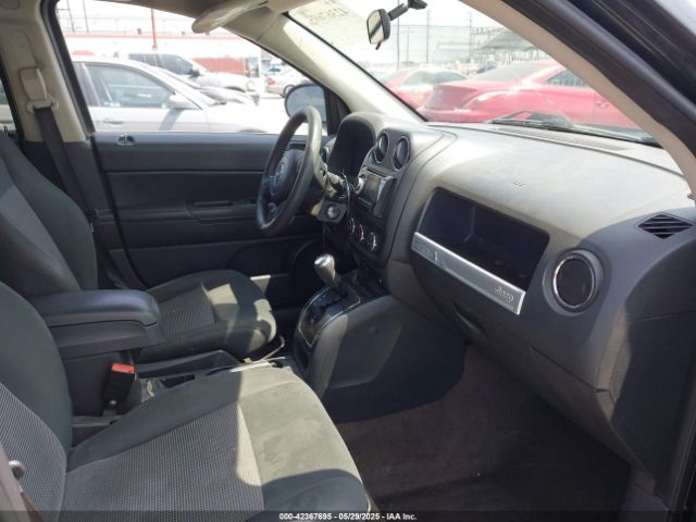 1C4NJCBA0ED777823 Jeep Compass Sport