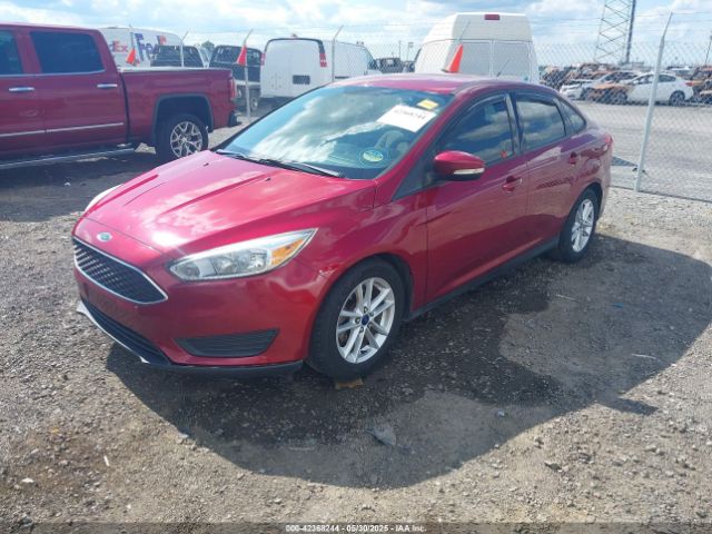 2015 FORD FOCUS 1FADP3F29FL338923 Photo 1