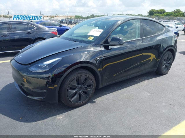 2025 TESLA MODEL Y 7SAYGAEE1SF285937 Photo 1
