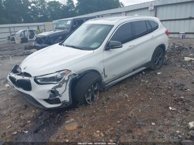 2016 BMW X1 WBXHT3C31G5E54407 Photo 1