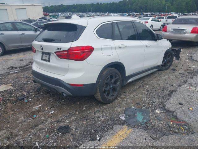 2016 BMW X1 WBXHT3C31G5E54407 Photo 3