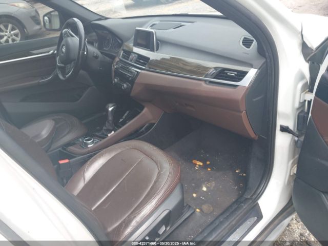 2016 BMW X1 WBXHT3C31G5E54407 Photo 4