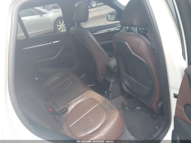 2016 BMW X1 WBXHT3C31G5E54407 Photo 7