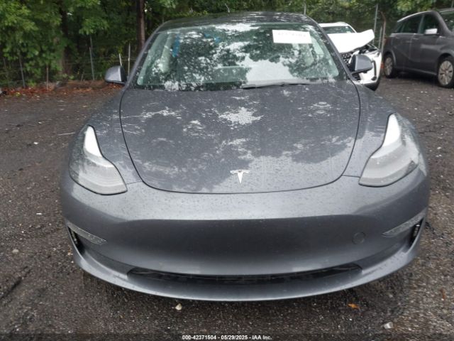 5YJ3E1EA7NF316347 Tesla 2022