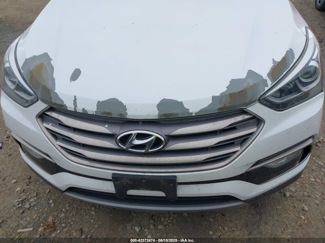5NMZU3LB0HH005687 Hyundai Santa Fe Sport 2.4l