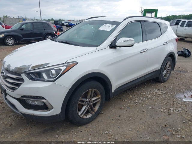5NMZU3LB0HH005687 Hyundai Santa Fe Sport 2.4l