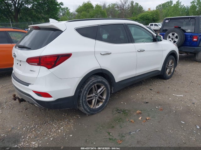 5NMZU3LB0HH005687 Hyundai Santa Fe Sport 2.4l
