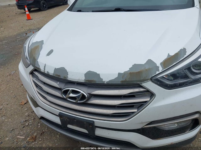 5NMZU3LB0HH005687 Hyundai Santa Fe Sport 2.4l