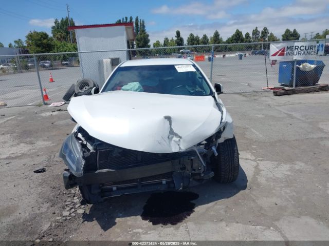 4T1BF1FK9GU582393 Toyota CAMRY SE