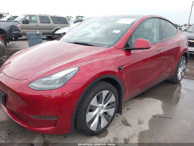 2024 TESLA MODEL Y 7SAYGDEE8RA276970 Photo 1
