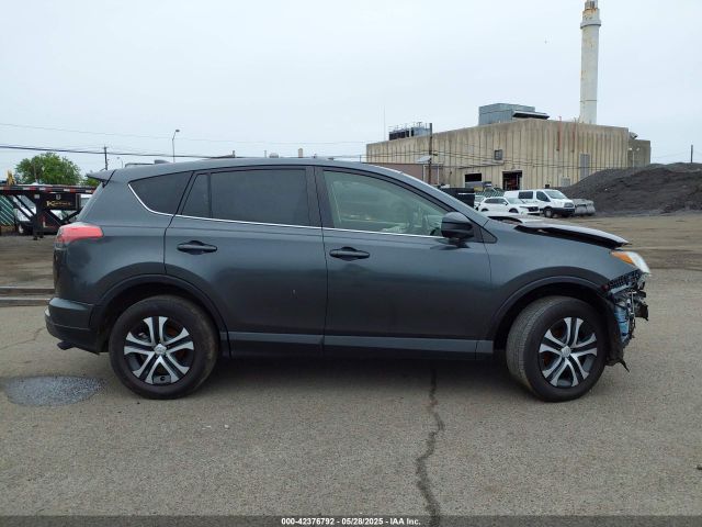JTMZFREVXJJ169369 Toyota RAV4 LE