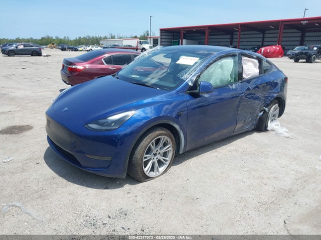 2024 TESLA MODEL Y 7SAYGDED4RF044747 Photo 1