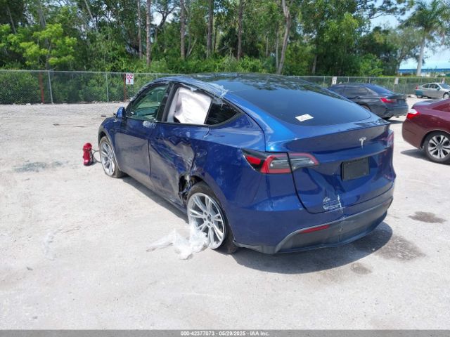 2024 TESLA MODEL Y 7SAYGDED4RF044747 Photo 2