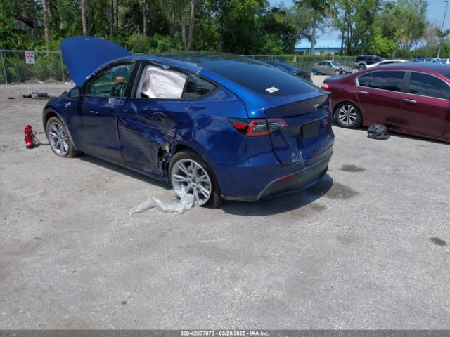 2024 TESLA MODEL Y 7SAYGDED4RF044747 Photo 5