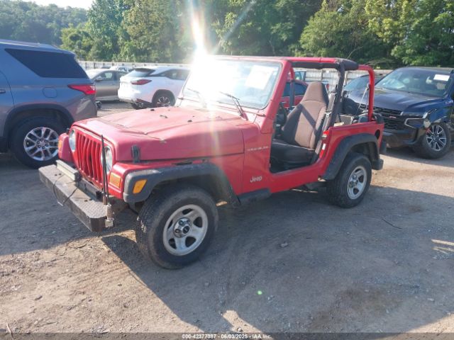2000 JEEP WRANGLER 1J4FA29P6YP775127 Photo 1