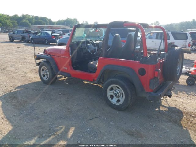 2000 JEEP WRANGLER 1J4FA29P6YP775127 Photo 2