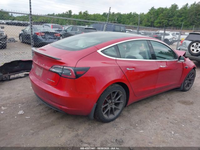 5YJ3E1EB8JF064241 Tesla 2018