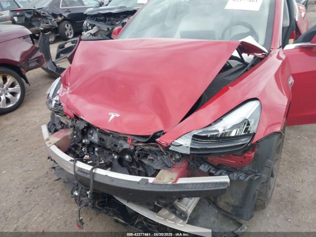 5YJ3E1EB8JF064241 Tesla 2018