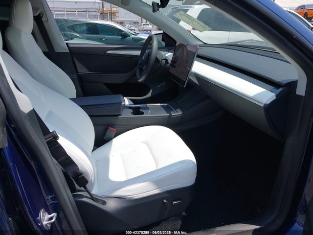 2023 TESLA MODEL Y 7SAYGDEE5PF902698 Photo 4