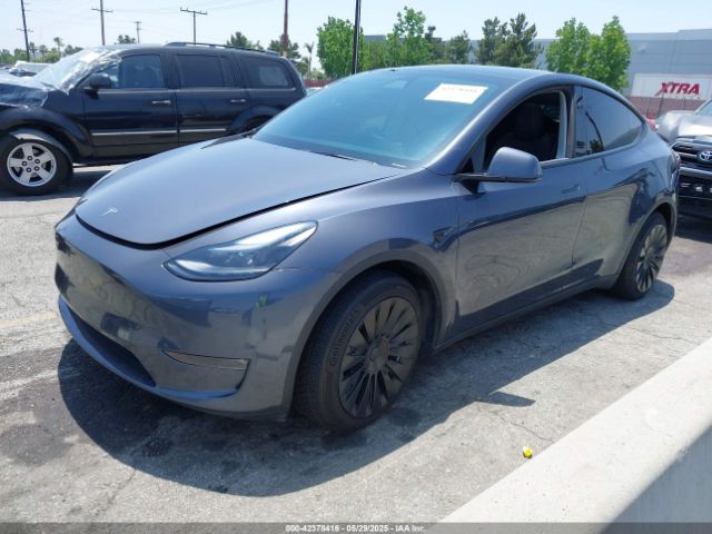 2023 TESLA MODEL Y 7SAYGDEE3PF806715 Photo 1