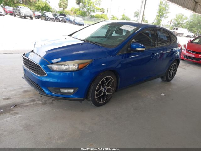 2018 FORD FOCUS 1FADP3M23JL227117 Photo 1