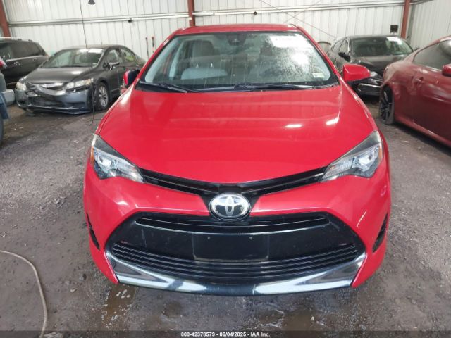 2T1BURHE4JC051221 Toyota COROLLA LE