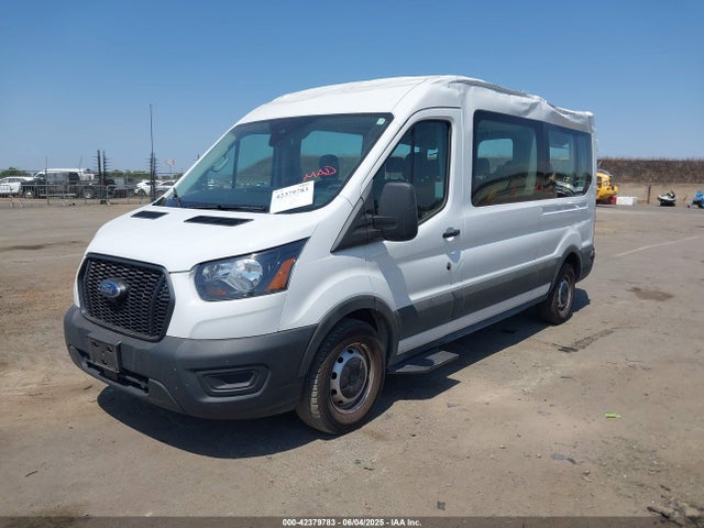 Ford 2023 2023 1FBAX2CG7PKC04821 Image 2