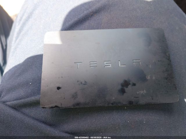 5YJ3E1EA4LF661560 Tesla 2020