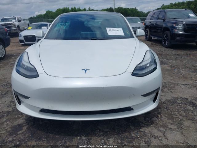 5YJ3E1EA4LF661560 Tesla 2020