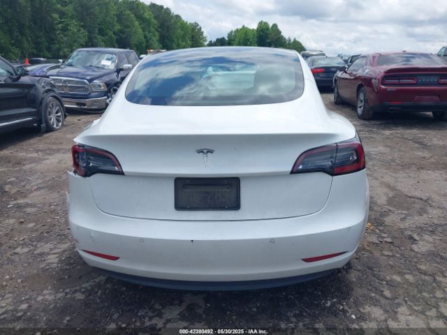 5YJ3E1EA4LF661560 Tesla 2020