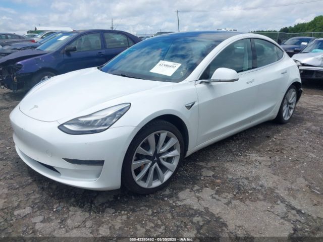 5YJ3E1EA4LF661560 Tesla 2020