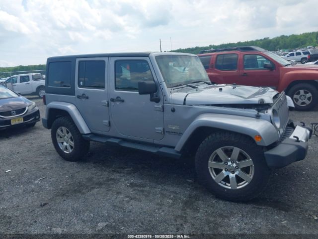 1C4BJWEG0EL129229 Jeep Wrangler Unlimited Sahara