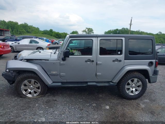 1C4BJWEG0EL129229 Jeep Wrangler Unlimited Sahara