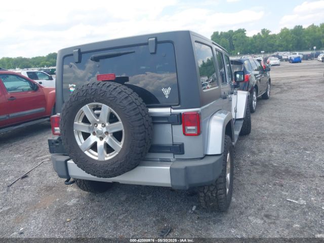 1C4BJWEG0EL129229 Jeep Wrangler Unlimited Sahara