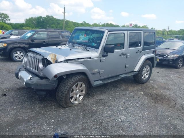1C4BJWEG0EL129229 Jeep Wrangler Unlimited Sahara