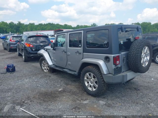 1C4BJWEG0EL129229 Jeep Wrangler Unlimited Sahara