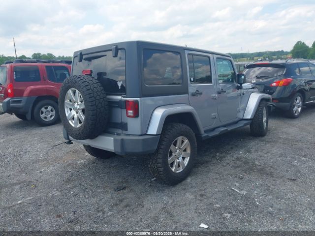 1C4BJWEG0EL129229 Jeep Wrangler Unlimited Sahara