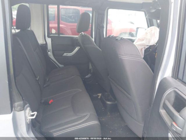 1C4BJWEG0EL129229 Jeep Wrangler Unlimited Sahara