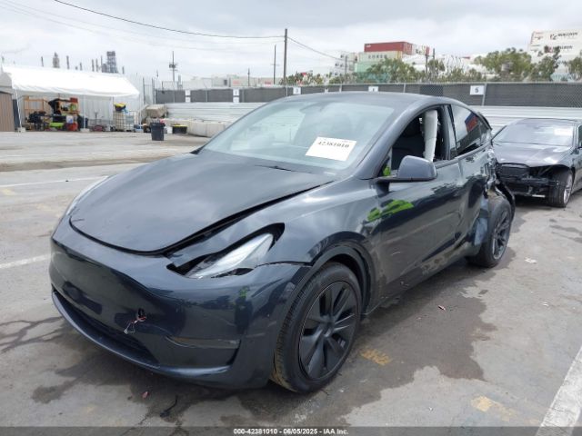 2025 TESLA MODEL Y 7SAYGDEE1SF285163 Photo 1
