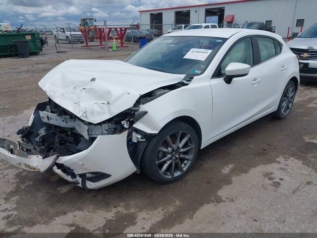 3MZBN1L39JM164672 Mazda py