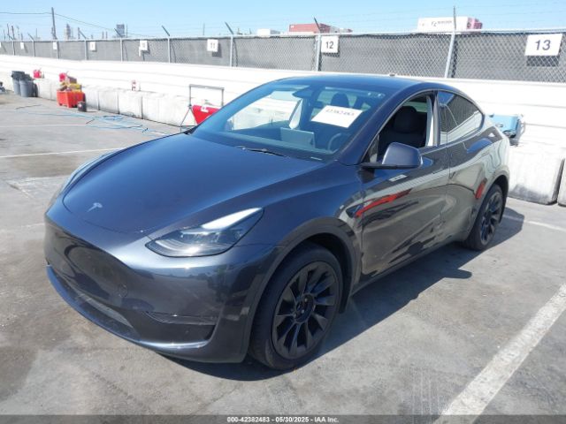 2024 TESLA MODEL Y 7SAYGDED9RF091854 Photo 1