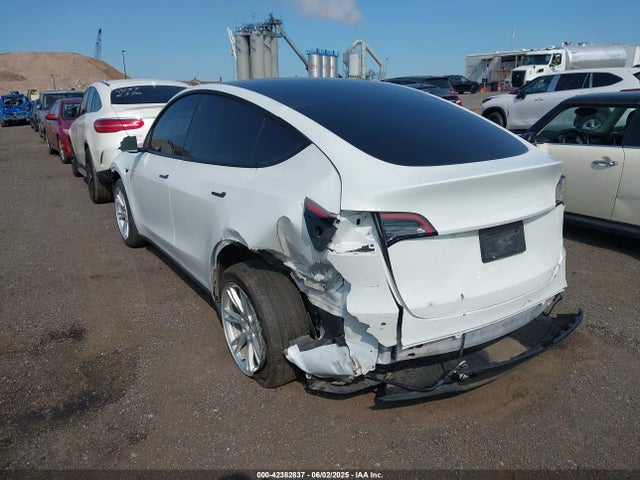 2023 TESLA MODEL Y 7SAYGDEEXPA060552 Photo 2