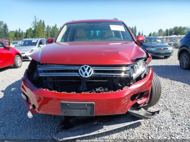WVGBV3AX7EW081912 Volkswagen Tiguan Sel