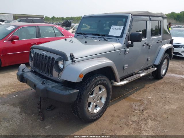 1C4BJWDG0FL703220 Jeep Wrangler Unlimited Sport