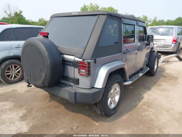 1C4BJWDG0FL703220 Jeep Wrangler Unlimited Sport