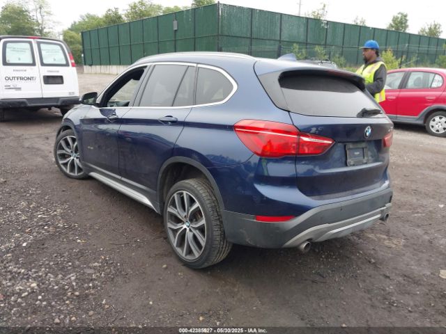 2016 BMW X1 WBXHT3C32G5E48485 Photo 2