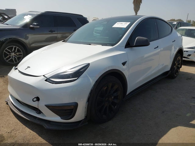 2023 TESLA MODEL Y 7SAYGDEE9PF887283 Photo 1