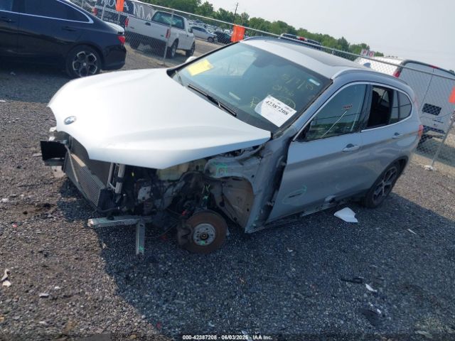 2018 BMW X1 WBXHT3C32J5K23486 Photo 1